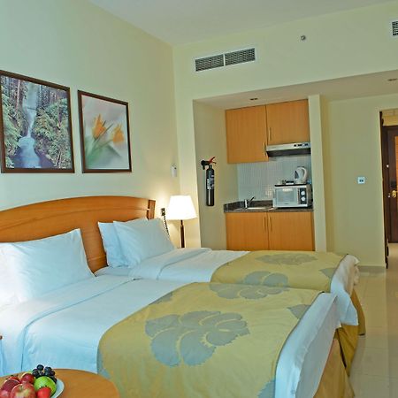 Golden Tulip Sharjah Aparthotel Kültér fotó