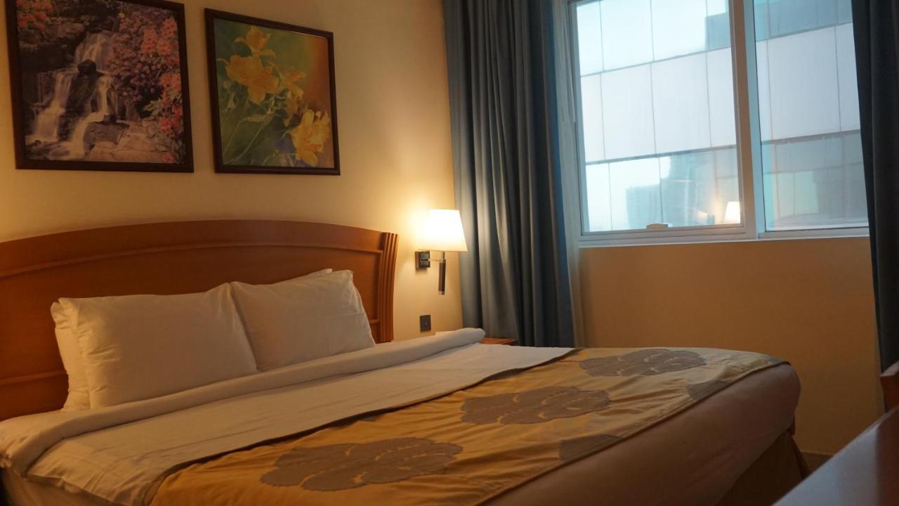 Golden Tulip Sharjah Aparthotel Kültér fotó