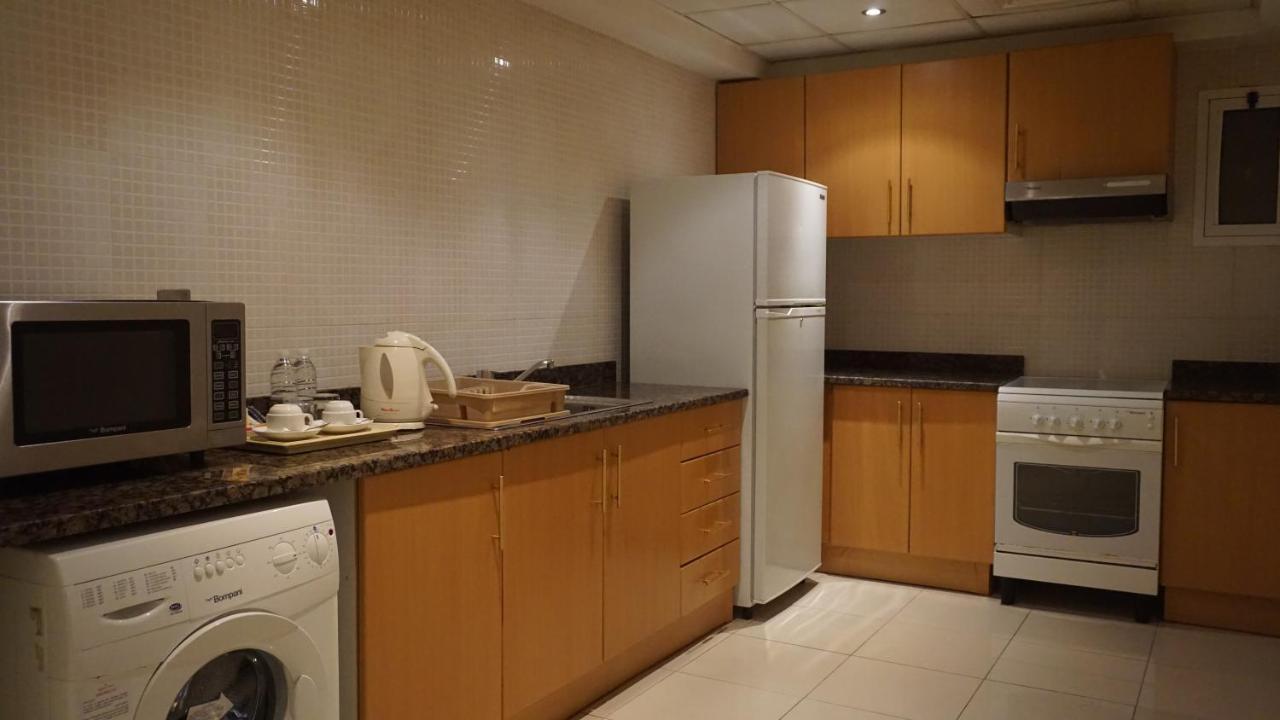 Golden Tulip Sharjah Aparthotel Kültér fotó