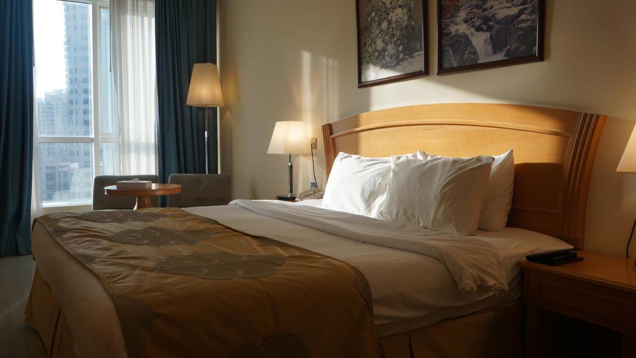 Golden Tulip Sharjah Aparthotel Kültér fotó