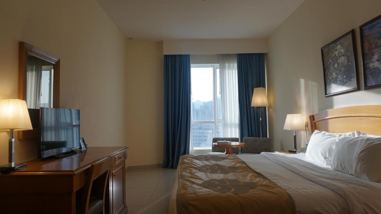 Golden Tulip Sharjah Aparthotel Kültér fotó