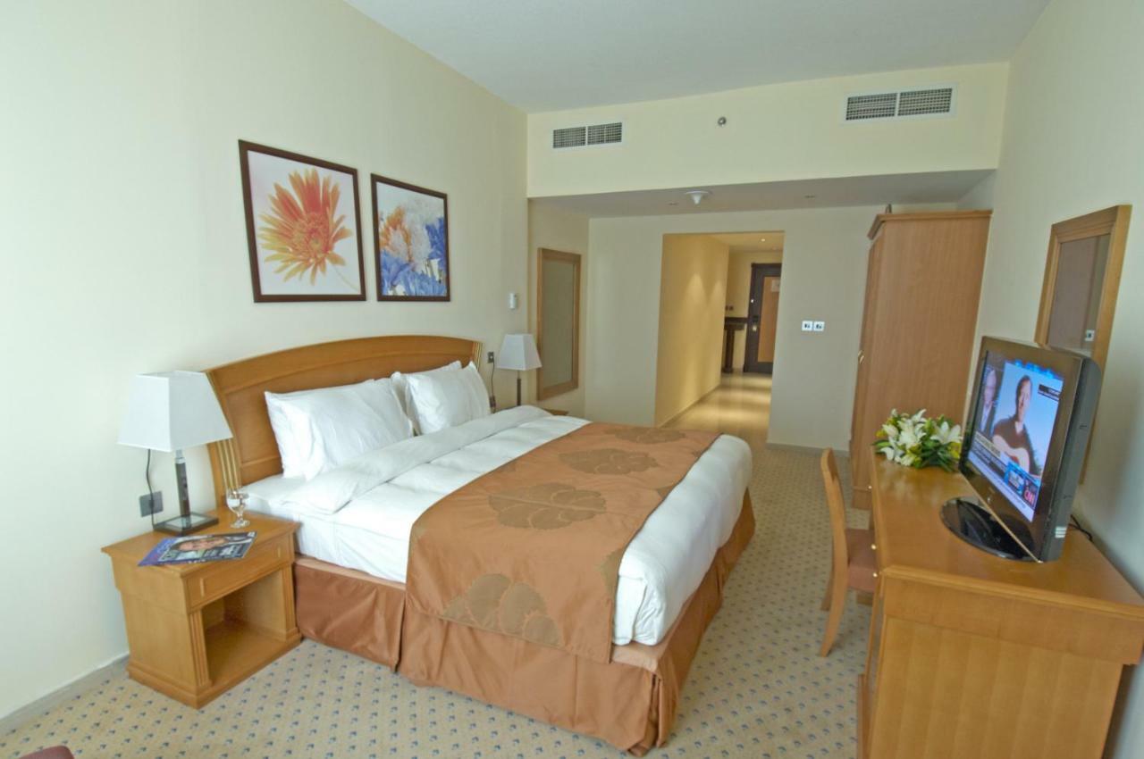 Golden Tulip Sharjah Aparthotel Kültér fotó
