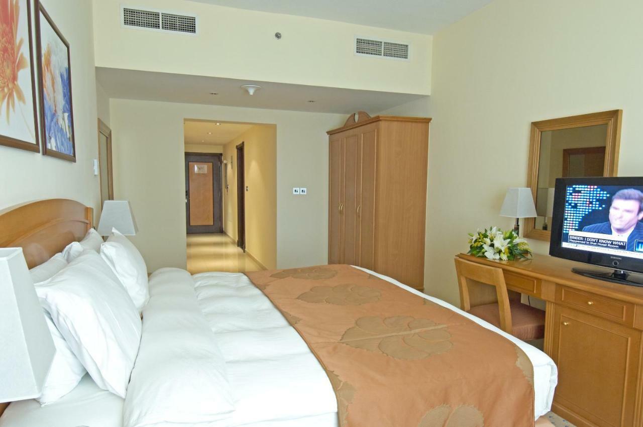 Golden Tulip Sharjah Aparthotel Kültér fotó