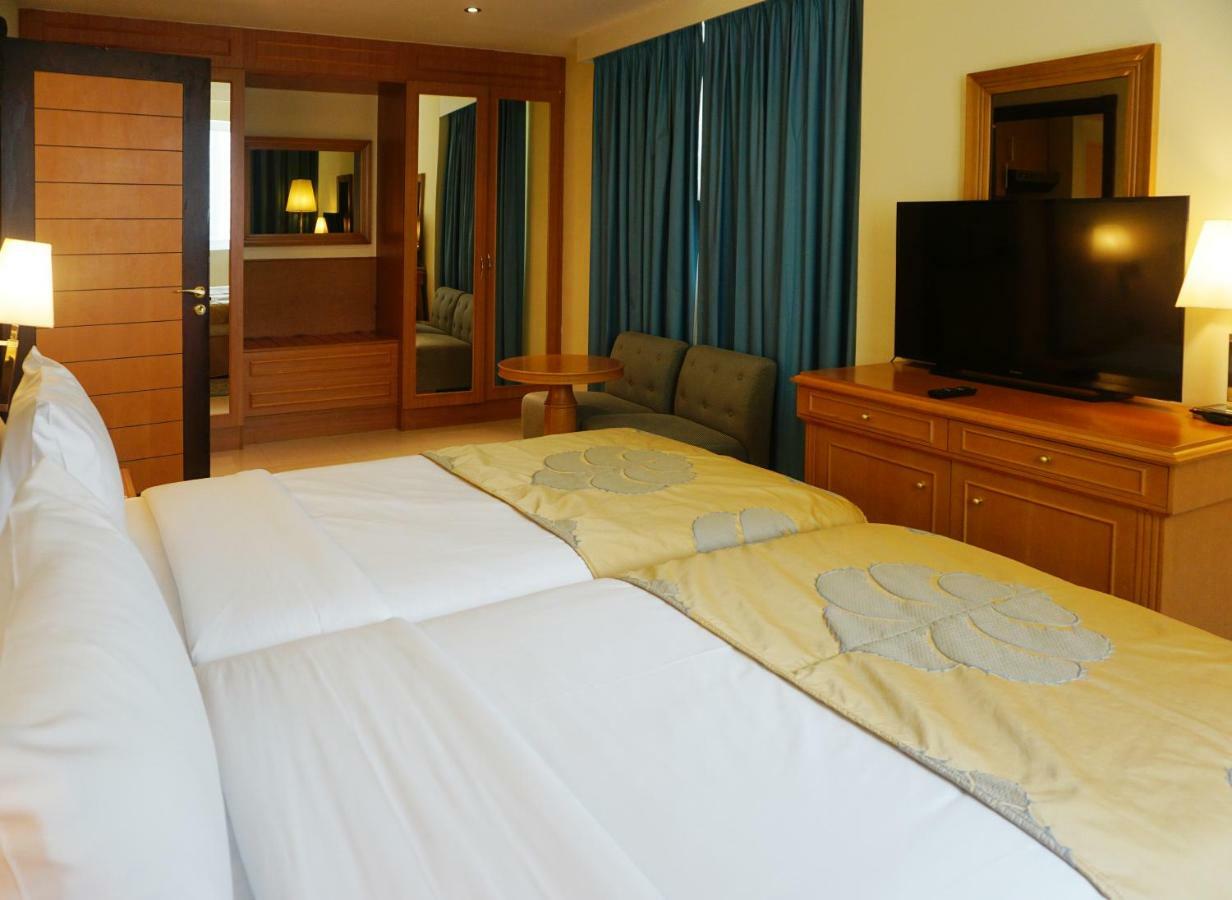 Golden Tulip Sharjah Aparthotel Kültér fotó