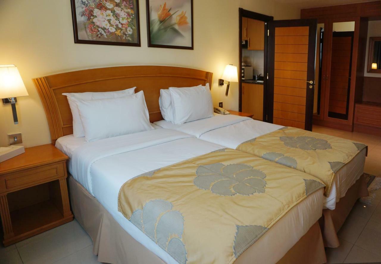 Golden Tulip Sharjah Aparthotel Kültér fotó